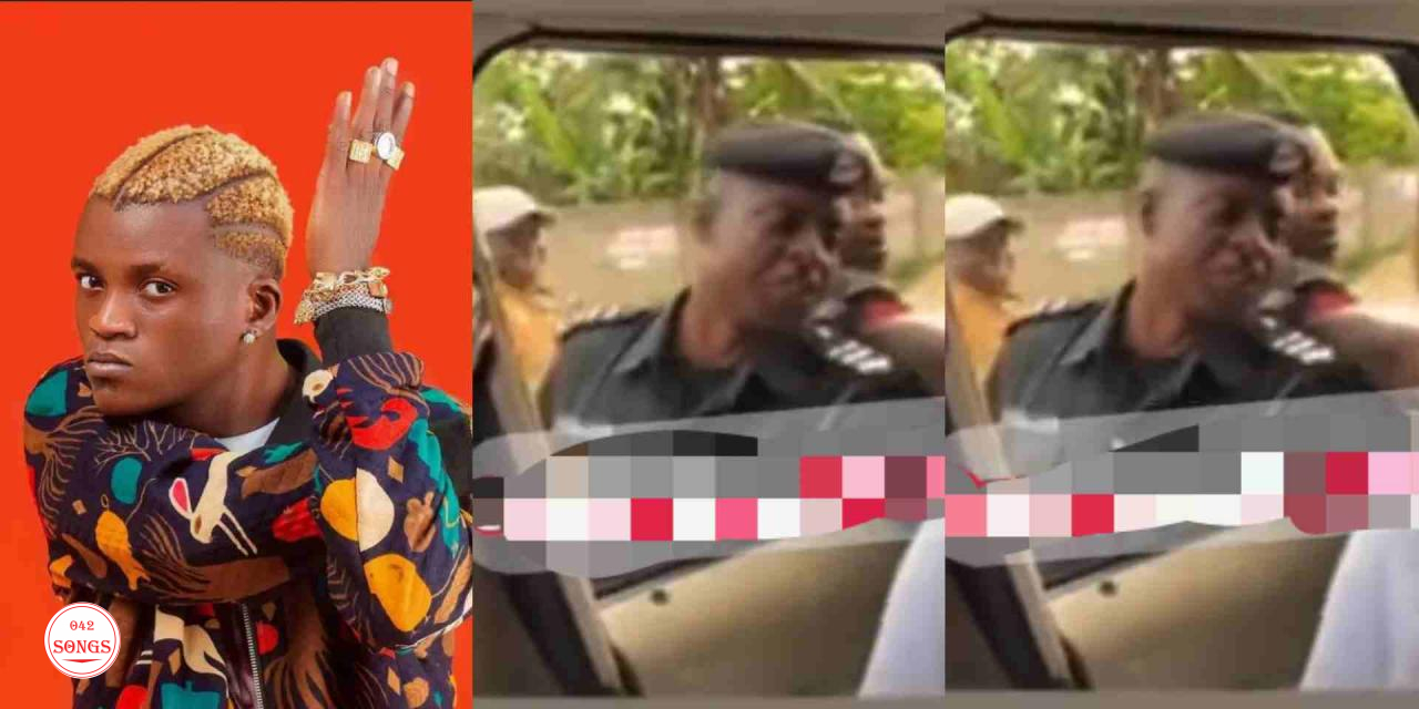 Police officer spotted begging profusely as Portable blesses fans with cash